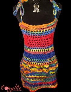 Embrace the colors of the rainbow with this stunning crochet coverup! Perfect for beach days and summer nights, this vibrant piece adds a splash of joy to any outfit. 🌈🧶 Size L - XL DM to inquire  #HandmadeWithLove #CrochetMagic #SummerVibes Multicolor Crochet Top For Spring Beach Cover-up, Multicolor Crochet Dress For Spring Beach Cover-up, Summer Festival Crochet Dress, Summer Crochet Dress For Festivals, Multicolor Crochet Beach Dress For Summer, Multicolor Crochet Dress For Vacation, Colorful Crochet Top For Summer, Multicolor Crochet Beachwear Dress, Bohemian Multicolor Crochet Dress For Beach