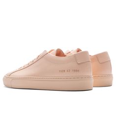 Taking on a contemporary aesthetic, the Common Projects Original Achilles Low makes an impression with its premium design. The design takes on a complete leather upper as well as a leather lining for added comfort. The gold-tone branding paired with the rubber outsole finishes up the remainder of the sneaker. Leather upper Leather lining Lace-up front Gold-tone branding Rubber outsole All sizes are listed in European Men’s sizing unless stated otherwise Style No: 1528-1996 Classic Sneakers With Calf Leather And Leather Lining, Classic Sneakers With Leather Lining And Calf Leather, Chic Formal Leather Sneakers, Chic Leather Sneakers With Textured Sole, Chic Leather Sneakers With Leather Sole, Chic Leather Sneakers, European Men, Luxury Sneakers, Common Projects