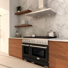 a stove top oven sitting inside of a kitchen next to a counter with pots and pans on it