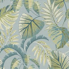 a blue and green tropical print wallpaper with leaves on the side, all in different colors