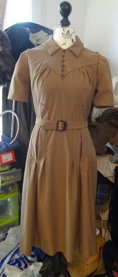 ~ Details:   Two style variation DRESS by 'Du Barry'  ~ Circa/Date: 1940s ~ Size/Measurements (Inches):     ~ Size: 20     ~ BUST: 38″     ~ Waist:  32″     ~ Hip: 41″ ~ Please Note: ~ You are buying a 'Professional Reproduced' copy of this sewing pattern. Copied from the original sewing pattern. Produced in Full Scale Pattern Pieces ready to cut with full instructions included. Reproduced on high quality 50 gm paper with black ink, durable and easier for reuse. Printed by a Professional Printing Company.   ~ With this product comes an accompanying 'Booklet' and inside the Booklet it includes: ~ A 2-page Instructions and Illustrations on 'How to Adjust Your pattern to your Personal Measurement.' ~ Personal Measurement Chart ~ Body Form Illustrations ~ Fitting Checklist ~ Metric Equivalency 1940s Tea Dress Pattern Simplicity, 1940s Utility Dress, 19402 Dress, 1940’s Winter Dress, Forties Fashion, Super Pictures, 1940s Outfits, Sew In Weave, Fashionable Accessories