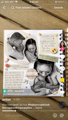 an open scrapbook with photos and text on the page, next to a phone