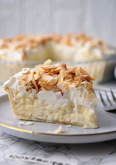 a piece of pie sitting on top of a white plate