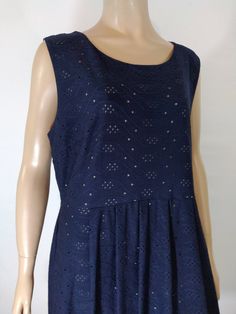 "Navy Blue Dress Women's Excellent Condition by ILE NY Size 16 Dark blue eyelet lace fabric, solid underdress underneath. Sleeveless bodice drop waist with gathers with flared out skirt. Pullover, stretchy. Excellent condition. High Quality. Easy to wear casual chic vintage for the disco sporting life. MEASUREMENTS: Length - 37\" Bust (underarms to underarms)  - 21\"x2 Waist - 38\" Hips - 24'x2 Sleeve - 0\" MODEL STATS: Ht. - 5' 8.5\" Bust - 34\" Waist - 25\" Hips - 35\" *Please check measurements to ensure proper fit and remember to allow extra room for movement.  You can compare these with something in your closet that fits you well.  We take great care to measure each piece. **Please note the color differences, color/contrast vary with different computers." Sleeveless Eyelet Dress For Spring, Fitted Sleeveless Dress With Cutwork Hem, Blue Eyelet Dress For Summer, Blue Eyelet Summer Dress, Vintage Blue Beaded Drop Earrings, Womens Navy Blue Dress, Vintage Blue Daywear Dress, Blue Retro Vintage Cotton Dress, 1920s Drop Waist Dress