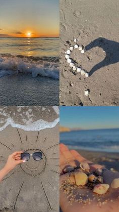 there is a hand that is holding shells in the sand at the beach and on the water's edge