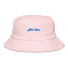 This Unstructured Terry Cloth Bucket Hat will add a dash of bright color and style to any spring or summer outfit. Pale pink colour bucket hat with vibrant blue text reading 'Happy Offline'.  100% terry cotton Classic brim with decorative stitching One size fits most 100% terry cotton Trendy Pink Cotton Sun Hat, Pink Bucket Hat With Curved Brim For Spring, Pink Spring Bucket Hat With Curved Brim, Spring Pink Bucket Hat With Curved Brim, Pink Short Brim Bucket Hat For Spring, Pink Cotton Bucket Hat For Spring, Pink Flat Brim Bucket Hat For Spring, Spring Pink Flat Brim Bucket Hat, Trendy Flat Brim Bucket Hat For Spring