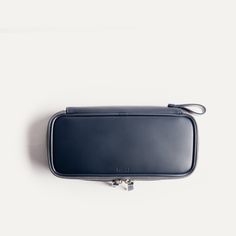 Our GINA toiletry bag is very efficiently sized: compact enough to fit into our 36-hour travel bags, and generous enough to carry all your toiletries.

 A format that's popular with all those who want to travel light. Its cotton/polyester blend interior is easy to wash.

Features :


	One main compartment (24 x 11 x 5 cm) - (9,45 x 4,33 x 1,97 Inch)
	A flat pocket (14.5 cm long/5,70 Inch), closed with a zip. 


Materials used:


	Main material: Semi-vegetable-tanned full-grain leather - Read more
	Secondary material: 100% recycled felt.
	Inner lining : Polyester canvas.
	YKK © metal zipper.


All our leathers are LWG (Leather Working Group) certified. This is a label responsible for assessing tanneries worldwide and encouraging best practice and positive social and environmental change in Modern Travel Accessories With Luggage Sleeve, Functional Travel Cosmetic Bag With Luggage Sleeve, Functional Rectangular Cosmetic Bag With Luggage Sleeve, Leather Travel Cosmetic Bag Rectangular Case, Classic Cosmetic Bag With Zipper For Travel, Classic Cosmetic Bag With Zipper Closure For Travel, Functional Cosmetic Bag With Luggage Sleeve For Daily Use, Modern Travel Cosmetic Bag With Zipper Pocket, Everyday Cosmetic Bag With Luggage Sleeve