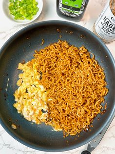 the noodles are being prepared and ready to be cooked in the skillet on the counter