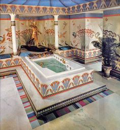 an ornately decorated bathroom with a jacuzzi tub