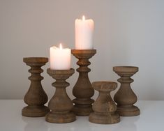 a group of candles sitting next to each other