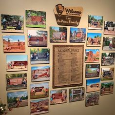 a wall covered in pictures and magnets next to a christmas tree with a sign that says welcome to the western family