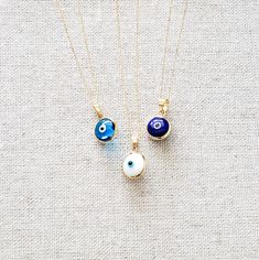 "Dark Blue Evil Eye Protection Charm Pendant Necklace in 14k Solid Gold for Women - Dainty Handmade Protection Necklace-18inch. The Yellow Gold Evil Eye Necklace \"Protection\" for Women is composed of high-quality 14 Karat Gold and glass/enamel. Evil Eye symbolizes fate protection and an open flow of communication. 🔳WARRANTY🔳 *6 Months warranty. *Free Shipping without price limit. *Easy Return and Replacement 30 days after purchase. Just contact me 😊 🔳EVIL EYE NECKLACE🔳 *Material: 14k Yell Blue Charm Necklace For Gift, Blue Round Charm Necklace Gift, Blue Pendant Necklace In 14k Gold, Blue Birthstone Round Charm Necklace, Blue 14k Gold Necklace With Charms, Blue 14k Gold Pendant Necklace, Blue Necklace With Adjustable Chain As Gift, Blue Necklace With Adjustable Chain For Gift, Blue Round Necklace With Adjustable Chain