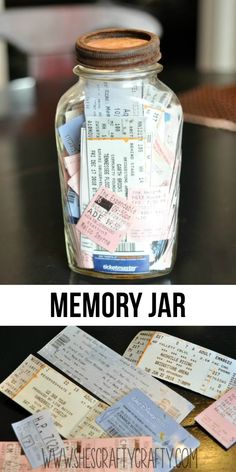 a jar filled with money sitting on top of a table next to a pile of tickets