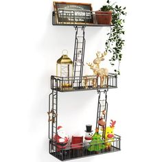 three tiered metal shelf with christmas decorations