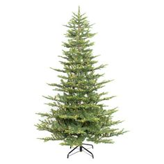 a small christmas tree on a stand with lights in the top and bottom branches, against a white background