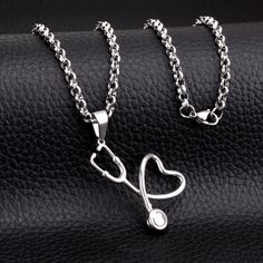 Adorable Stethoscope Heart Pendant Necklace. Perfect For My Nurses, Doctors, Future Meds, Students, Etc. Made Of Zinc Alloy Metal And Polished With Silver. Chain Hangs Approximately “18 With “2 Extension. Brand New Boutique Item Without Tag. Makes A Perfect Gift Or Keep For Self. Mix And Match Any Items Listed 4 For $20 And Save Just Bundle Your Items And Send Offer!!! Hypoallergenic Heart Shaped Metal Necklace, Hypoallergenic Heart-shaped Metal Necklace, Stethoscope Heart, Stethoscope Necklaces, Nurse Doctor, Collar Jewelry, Colorful Heart, Heart Pendant Necklace, Heart Pendant