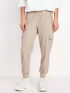 elastic waistband zippered hip pockets flap-cargo pockets at thigh go-dry wicks moisture breathable sits at belly button relaxed thigh 27" regular inseam 25" petite inseam 30" tall inseam models are approx.  5'9" and wear sizes s (4), l (12), and xl (18)machine wash according to the care instruction label  . Best Holiday gift for Women , perfect Joggers for Christmas! Cargo Joggers, Family Pajamas, Old Navy Women, Family Maternity, Petite Size, Toddler Boys, Old Navy, Active Wear, Zipper