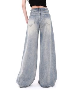 Light gray wash denim wide-leg jeans featuring pastel rainbow brush strokes on the front in a vintage style Size:• S: Waist: 62cm/ 24.4 in, Hips: 96cm/ 37.8 in, Length: 100cm/ 39.4 in• M: Waist: 66cm/ 26.0 in, Hips: 100cm/ 39.4 in, Length: 102cm/ 40.2 in• L: Waist: 70cm/ 27.6 in, Hips: 104cm/ 40.9 in, Length: 104cm/ 40.9 in• XL: Waist: 74cm/ 29.1 in, Hips: 108cm/ 42.5 in, Length: 106cm/ 41.7 inMaterial: Denim Faded Wide Leg Washed Flare Jeans, Distressed Washed Blue Wide Leg Flare Jeans, Faded Distressed Wide-leg Flare Jeans, Washed Blue Distressed Wide Leg Flare Jeans, Trendy Washed Full-length Flare Jeans, Trendy Washed Flare Jeans Full Length, Trendy Washed Full Length Flare Jeans, Faded Wide-leg Flare Jeans For Spring, Faded Wide Leg Pants For Spring