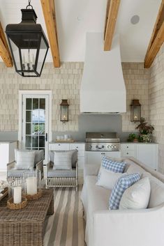 a living room filled with furniture and a fire place