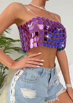 Expertly designed for maximum style and comfort, our Backless Acrylic Camisole Crop Top features a metallic sequin design in a stunning purple shade. The backless design adds a touch of allure, making it the perfect addition to your wardrobe. Elevate any outfit with this must-have piece. Fabric: Non-Stretch Material: Acrylic Fiber Summer Sequined Backless Halter Top, Sequined Backless Halter Top For Summer, Backless Sequined Halter Top For Summer, Strapless Sequined Crop Top For Summer, Purple Sleeveless Club Top, Fitted Purple Tank Top For Night Out, Summer Halter Top With Sequins And Stretch, Glamorous Backless Tank Top For Summer, Summer Stretch Halter Top With Sequins