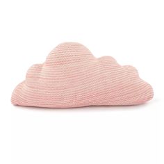 a pink knitted cloud pillow on a white background with the word love written across it