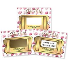 three gold frames with pink flowers on them