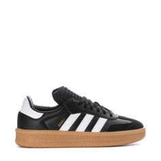 The Samba started as an indoor soccer trainer, but for over 70 years, it's been a staple off the field. The adidas Samba XLG youth shoes bring a fresh twist to the classic with an oversized design and a mix of leather and suede. The timeless colors keep the style effortlessly simple. Pair them with baggy jeans and a graphic tee for a casual day out or with wide-leg pants and your favorite bucket hat for a go-to look.Features: Classic lace closure. Woven "adidas SAMBA" tongue label. Printed "SAMB Adidas Low-top Basketball Shoes With Gum Sole, Adidas Sports Sneakers With Gum Sole, Adidas Sneakers With Gum Sole For Sports, Adidas Skate Shoes With Gum Sole For Sports, Nike Fits, Soccer Trainer, White Kicks, Indoor Soccer, Youth Shoes