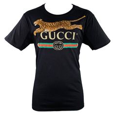 GUCCI t-shirt in a black jersey fabric featuring GUCCI logo, leopard applique, and crew neck.Very Good Pre-Owned Condition. Minor marks. Marked: S Measurements: Shoulder: 21 inches Chest: 42 inches Sleeve: 8.5 inches Length: 27.5 inches Sui Generis Reference: 132412 Category: T-shirt More Details Brand: GUCCI Size: S Gender: Male Color: Black Color 2: Multi-Color Pattern: Logo Style: Short Sleeve Made in: Italy Age Group: Adult Luxury Gucci Tops, Luxury Gucci Tops For Daywear, Gucci Black Top For Spring, Black Gucci Top For Party, Gucci T Shirt Women, Gucci T Shirt, Logo Style, Pattern Logo, Gucci Logo