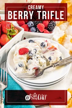 a white plate topped with ice cream and berries next to a bowl of strawberries