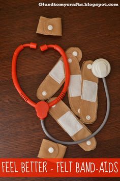 a wooden table topped with bandages and a stethoscope