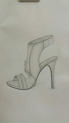 a drawing of a high heeled shoe on a piece of paper with a pen