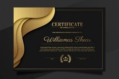 a black and gold certificate with an elegant pattern on the front, it has a golden ribbon