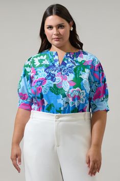 Treat yourself to something oh-so sweet like the Lavera Floral Waterlilly Balloon Sleeve Top. A beautiful blue multi floral print shapes short balloon sleeves with buttons and a split neckline. Finish the look with white shorts and you fav jewelry. - Split- Balloon sleeves- Breathable- Relaxed fit- Color: Blues MulSize + Fit - Model is 5'10" and wearing size 2X- Measurements taken from size 2X - Chest: 26 1/2"- Length: 28 3/4" Fabric Self: 100% Cotton Style Number STT17198PAX Flowy Floral Print Top With Balloon Sleeves, Floral Print Balloon Sleeve Cotton Top, Luxury Floral Print Balloon Sleeve Blouse, Multicolor Printed Balloon Sleeve Top, Blue Vibrant Print Short Sleeve Top, Balloon Sleeve Top, Cotton Style, White Shorts, Sleeve Top