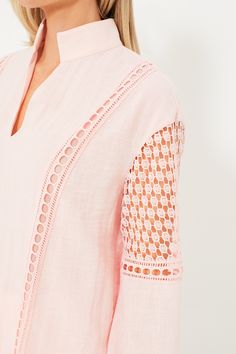 Extra cute thanks to the pale pink hue and eyelet detailing, the Jane Blouse will be playing on repeat in our closets this summer. With long blouson sleeves that feature delicately crafted cutouts and a relaxed, breezy fit that makes for effortless all day wear, you are sure to receive lots of compliments on this lightweight luxe style. A sweet way to dress up your most loved denim, from beach bonfires to al fresco spritzes with the gals, there's no wrong way to style this refreshingly chic top. Spring Blouse With Unlined Sleeves For Daywear, Spring Eyelet V-neck Top, Spring V-neck Eyelet Top, Long Sleeve Blouse For Daywear With Cutwork Hem, Chic Long Sleeve Tops With Cutwork Hem, Spring V-neck Eyelet Blouse, Feminine Summer Blouse With Broderie Anglaise, Long Sleeve Tops With Broderie Anglaise For Spring, Spring V-neck Top With Unlined Sleeves