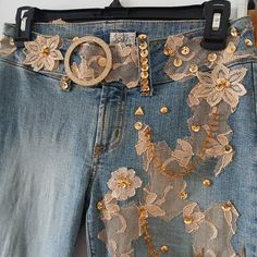 This Pair Of Mid Rise Jeans Is A Unique Vintage Item! Can't Find It Nowhere Anymore. It Is The Jeans For Fency Occasions And Less Formal Too. It's Stunning Embroidery Design Is A Variety Of Gold Details Allover The Right-Front Leg Only & All Around The Waist Which Makes It More Unique And Different. It Is Spotless And In Perfect Condition! Size 3 That Equals A 25/26. Jeans Is Cottom. The Denim Wash Is Soft And Bohemian. It Has Elastin Material With Good Stretch. Legs Are Similar To The Straight But Just A Bit Slightly Flare. Wear Them And Cant Help Having Heads Turned Over You! This Item Is Made In Usa. Cool Jeans Design, Only Jeans, Embellished Jeans, Designer Jeans, Good Stretches, Mid Rise Jeans, Gold Details, One And Only, Denim Wash