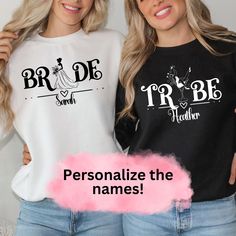 two women wearing matching shirts with the words bride and personalized names on them in pink