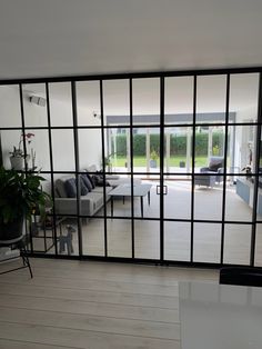 an open living room with sliding glass doors