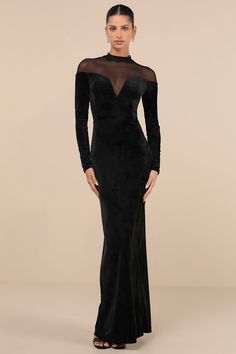 You'll be admired now and forever for how immaculate you look in the Lulus Exemplary Allure Black Velvet Mock Neck Long Sleeve Maxi Dress! Stretchy, plush velvet velour shapes this glamorous dress that features a sheer mesh dÃ©colletage and a chic mock neckline atop a plunging sweetheart-style bodice with princess-seam details and long sleeves. The fitted waist tops a figure-flaunting column skirt that falls to sophisticated maxi hem with a kick pleat at the back. Button-loop closures secure abo Long Sleeve Wedding Guest Dress Winter, Simple Long Black Dress, Prom Dress Shops, Long Sleeve Wedding Guest Dresses, Glamorous Dress, Winter Wedding Guest Dress, Dress Shops, Column Skirt, Mock Neck Long Sleeve