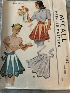 an old sewing pattern for a dress and skirt with flowers on the front, as well as a woman holding a cake