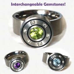 Interchangeable Gems Titanium Ring: Peridot, Sky Blue Topaz & Amethyst Are Included & Can Be Worn As The Central Gem, Or Use Any Other 6mm Round Stone. This Wide-Band Unisex Ring Would Work For Men Or Women (Or Nb) & Is Made From Titanium. Limited Edition Design With Ethically Sourced Natural Gemstones.This Would Be A Fabulous Christmas, Chankukah (Hanukkah, Hanukah), Birthday, Graduation, Mother's Or Father's Day Gift, Or Treat Yourself! Bundle 2+ Items For Best Deal. I'm A Certified Gemologist Modern Jewelry With Gemstone Accents For Anniversary, Modern Gemstone Accents Jewelry For Anniversary, Modern Amethyst Jewelry With Accent Stones, Modern Jewelry With Interchangeable Round Pieces, Modern Multi-stone Silver Gemstones, Modern Interchangeable Round Jewelry, Modern Purple Jewelry With Accent Stones, Modern Stainless Steel Gemstone Jewelry, Fabulous Christmas