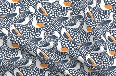 a blue and orange seagull fabric with white dots