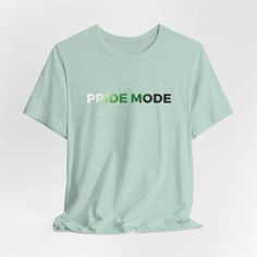 a t - shirt with the word pride mode printed on it in green and white