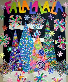 a bulletin board decorated with colorful paper decorations