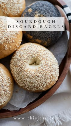 Sourdough Discard Bagels topped with sesame seeds on a wooden tray. Sourdough Discard Bagels, Discard Bagels, Sourdough Bagel, Dough Starter Recipe, Overnight Sourdough, Yeast Baking, Cinnamon Raisin Bagel, Sourdough Bagels