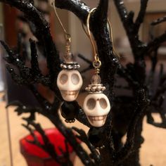 "Make all of your \"Ghoul-friends\" jealous with these adorable Skull Dangle Earrings. This is Spooky Vintage Glamour at its best!                                  The perfect October Hostess Gift  These bone- colored howlight skull beads are accentuated with black faceted crystals and 4mm Czech glass crystals.   1 1/4\"L x 1/2\" W These dangle skull earrings will complete your Halloween wardrobe! You want to see these earrings in multi- colors?! Check out the Colored Skull Earrings here: https: Glam Party, Skeleton Earrings, Bone Color, Beaded Skull, Skull Earrings, Halloween Skeletons, Faceted Crystal, Vintage Glamour, Etsy Vintage