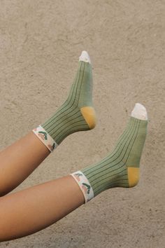 Satisfy your sock game with Candice Socks! These cozy crew socks feature a playful striped pattern and cute floral trim that'll keep your feet feeling fresh and funky. Step up your style with these green and cream beauties. Candice Socks-Green/Cream, boutique clothing, casual, the perfect socks! Boutique Clothing Green Summer Socks, Green Cotton Winter Socks, Green Cotton Summer Socks, Cute Green Socks For Spring, Trendy Green Socks For Spring, Trendy Green Cotton Socks, Playful Cotton Socks For Summer, Playful Green Winter Socks, Gold Hair Clips