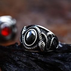 Customized and made to order just for you the way you want it. - Stainless Steel grade - Gemstone style rings - Black color CZ stone (onyx color) - Ancient silver color ring - Other shapes & styles available - Gemstones and other shapes can be customized as an addon. - Bundle together with addons like jewelry boxes, cleaning clothes, special gift wrap, cards, and more. Crafted with precision and attention to detail, this ring is made from the finest materials to ensure durability and longevity. Black Metal Rings For Halloween, Black Stainless Steel Rings For Halloween, Black Punk Rings For Halloween, Punk Black Ring For Halloween, Punk Black Rings For Halloween, Halloween Black Stainless Steel Ring, Adjustable Black Punk Style Rings, Punk Style Adjustable Black Ring, Vintage Black Rings For Halloween