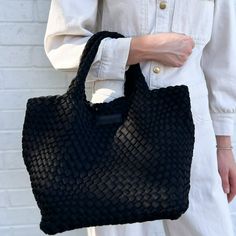 Our most popular woven totes are handwoven with a lycra blend and contrasting weave. Each tote comes with a matching pouch and detachable strap to transform your tote into a crossbody! Color: Bone Dimensions: Expanded: 18” x 9” x 8” / 6” Handle Drop Woven Double Handle Bags For On-the-go, Double Handle Woven Leather Crochet Bag For Everyday Use, Everyday Double Handle Crochet Bag With Woven Leather, Everyday Crochet Bag With Woven Leather And Double Handle, Crochet Leather Bag With Double Handle For Everyday Use, Crochet Tote Bag With Woven Leather, Black Crochet Bag With Woven Leather, On-the-go Woven Shoulder Bag With Double Handles, Chic Black Crochet Bag With Woven Leather