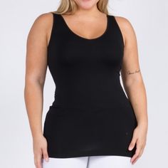 This Will Become Your Fave, Go To Top. I Live In Mine! This Is The Long Version Of This Cami. Available In Shorter Version In My Closet. This Is Reversible. One Side Is A U-Neck. Flip It Around And It Becomes A V-Neck! Two In One Style. One Plus Size. Very Stretchy. This Seamless Tank Makes Styling Any Outfit A Breeze! Featuring A V-Neckline And Fitted Silhouette In A Buttery, Soft Fabric That's Very Comfortable For Wearing All Day. Wide Shoulder Straps V-Neckline Back Scoop Neck Fitted Silhouet Snug Fit Sleeveless Tops With Built-in Bra, Black Tank Top For Yoga With Bust Support, Black Tank Top With Bust Support For Yoga, Black Tank Top With Medium Bust Support For Yoga, Black Stretch Camisole With Built-in Bra, Black Scoop Neck Tank Top With Built-in Bra, Black Scoop Neck Tank Top With Bust Support, Black Camisole With Built-in Bra For Layering, Supportive Black Tops For Yoga