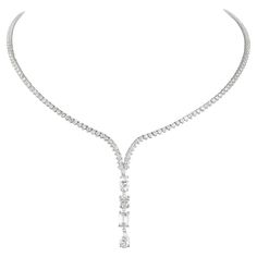 Exquisite and timeless diamonds drop tennis necklace. High jewelry by Alexander Beverly Hills. Center marquise, oval, emerald cut and pear diamond, 2.22 carats. Approximately G/H color and VS clarity. 179 round brilliant diamonds, 6.42 carats total. Approximately G/H color and SI clarity. Four prong set in 18k white gold, 16 inches 183 diamonds, 8.64 carats total. Accommodated with an up to date appraisal by a GIA G.G. upon request. please contact us with any questions. Item Number N6538 White Diamond Jewelry, Drop Necklaces, Diamond Tattoos, Solitaire Diamond Pendant, Silver Diamond Necklace, Pearl Drop Necklace, Diamond Pendant Sets, Diamond Tennis Necklace, White Gold Necklace